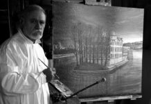 Sergio Birga mit dem Gemälde „Les Anciennes usines Renault“. Foto: PR